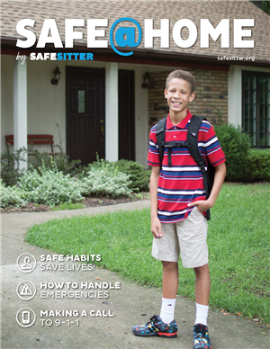 A smiling young boy wearing a red and blue striped shirt, khaki shorts, and a backpack stands outside a suburban home, representing the confidence and preparedness taught in the Safe@Home program.